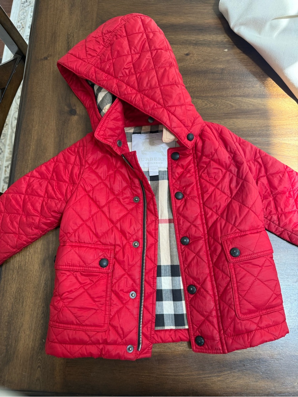 Burberry Kids Quilted Hooded Jacket in Red with Plaid Lining
